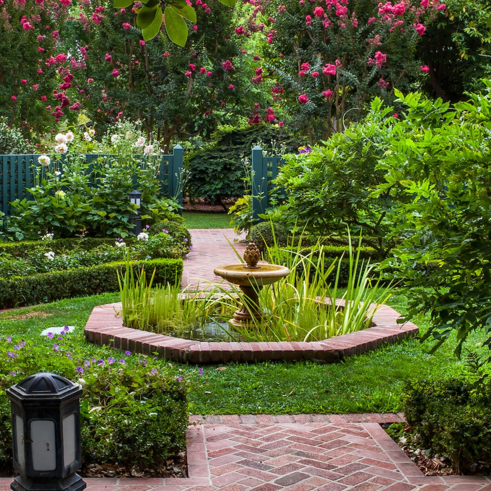 A fountain in Gamble Garden's Wisteria Garden